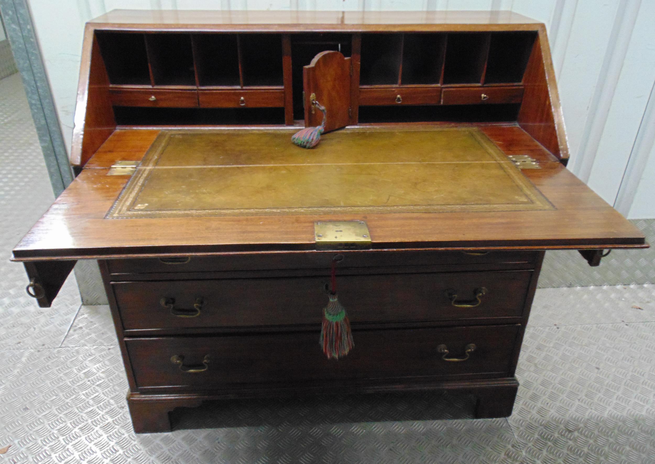 A 19th century rectangular mahogany bureau , the four drawers with brass swing handles on four - Image 2 of 2