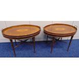 A pair of Edwardian oval mahogany inlaid tea tray tables, on simulated bamboo stands, 61 x 67.5 x