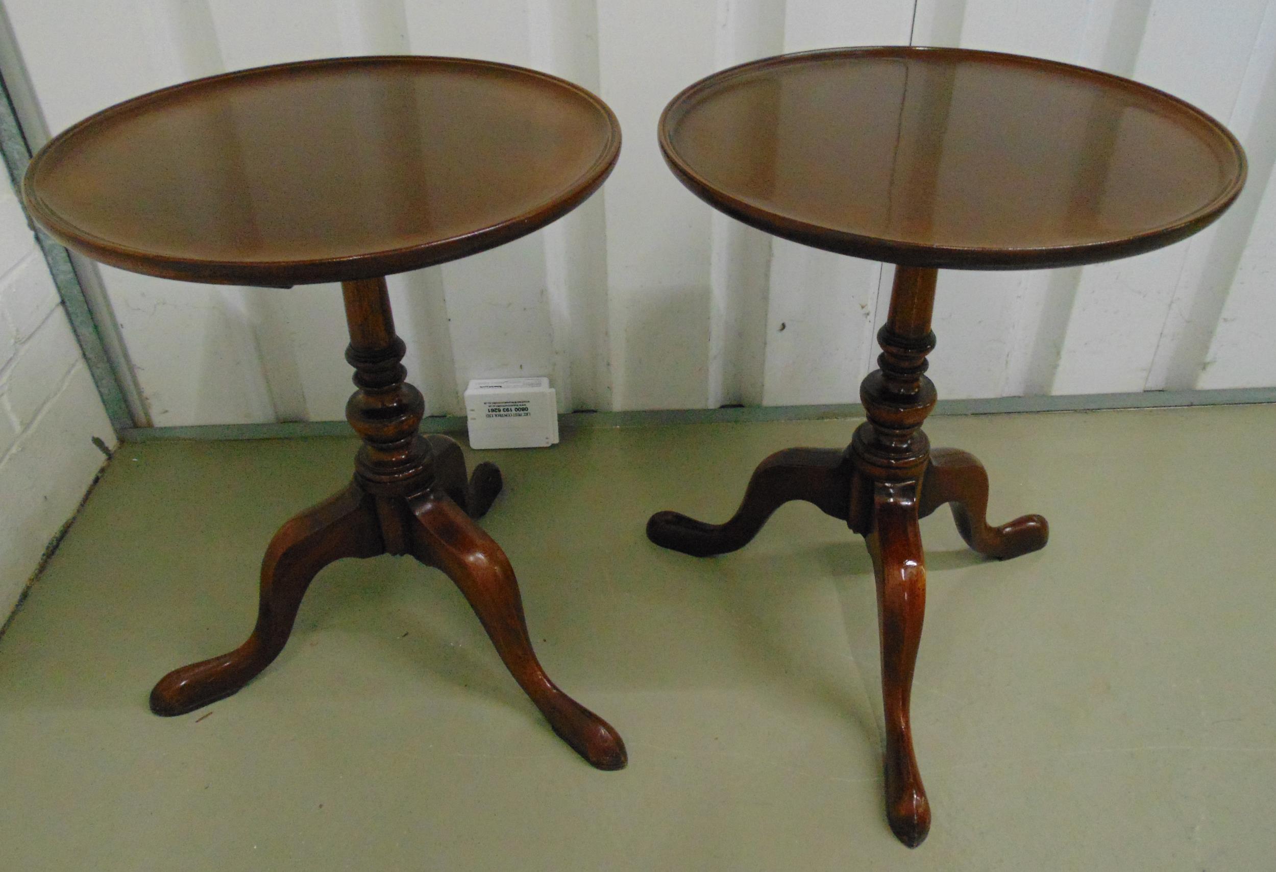 A pair of mahogany circular wine tables on three outswept supports, 54 x 42.5cm