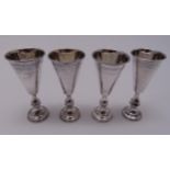 Four hallmarked silver Kiddush cups, Birmingham 1938, approx total weight 82g