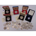 A quantity of pre 1947 silver coins and proof silver coin, approx total weight 512g