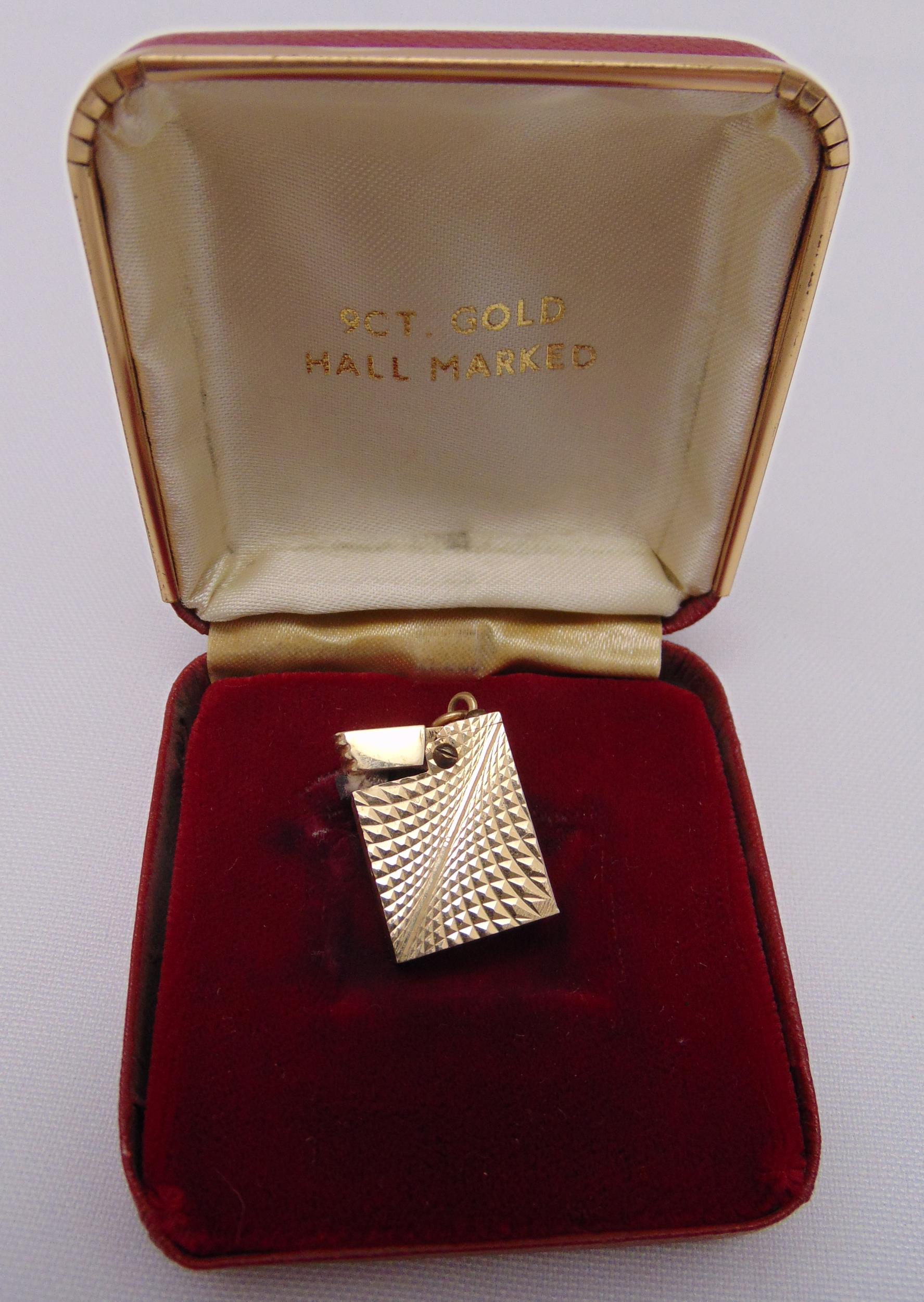 9ct yellow gold miniature cigarette lighter in original fitted case