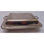 A hallmarked silver entree dish and cover, rounded rectangular with gadrooned border, the pull off