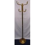 A brass hat and coat stand of tubular form on raised circular base, 176.5cm (h)