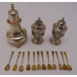 A quantity of hallmarked silver to include three pepperettes, and twelve silver gilt condiment