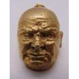 9ct gold charm in the form of Churchills head, approx total weight 14.9g