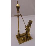 Brass figurine of a lamp lighter with his dog on raised rectangular base, 31cm (h)