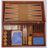 A late 19th century cased games compendium to include backgammon, chess, dominoes, horse racing