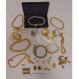 A quantity of costume jewellery to include necklaces, earrings, brooches, bangles and bracelets,