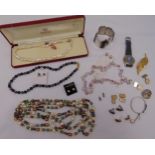 A quantity of costume jewellery to include necklaces, earrings and a bracelet