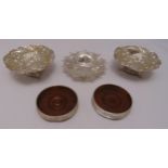 Three hallmarked silver bonbon dishes and two coasters (5)