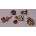 Six Royal Crown Derby figurines of animals to include a badger, an owl and a frog, marks to the