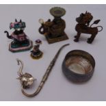 A quantity of elephant and animal figurines, a white metal dish and a white metal opium pipe (6)