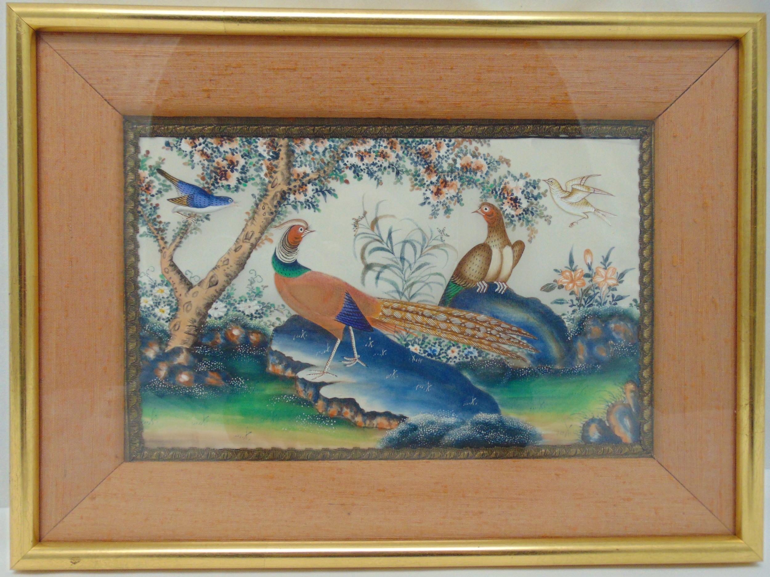 A Chinese framed and glazed pith painting on rice paper of peacocks in a landscape, 19.5 x 30cm