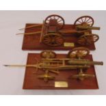 Two wooden models by R A Canons of an English and a French gun carriage with brass canons on