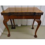 A Victorian mahogany games table cum dining table, the cabriole legs with ball and claw feet, 76 x