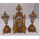 A late 19th century French gilt metal clock set with porcelain panels, Arabic numerals, two train