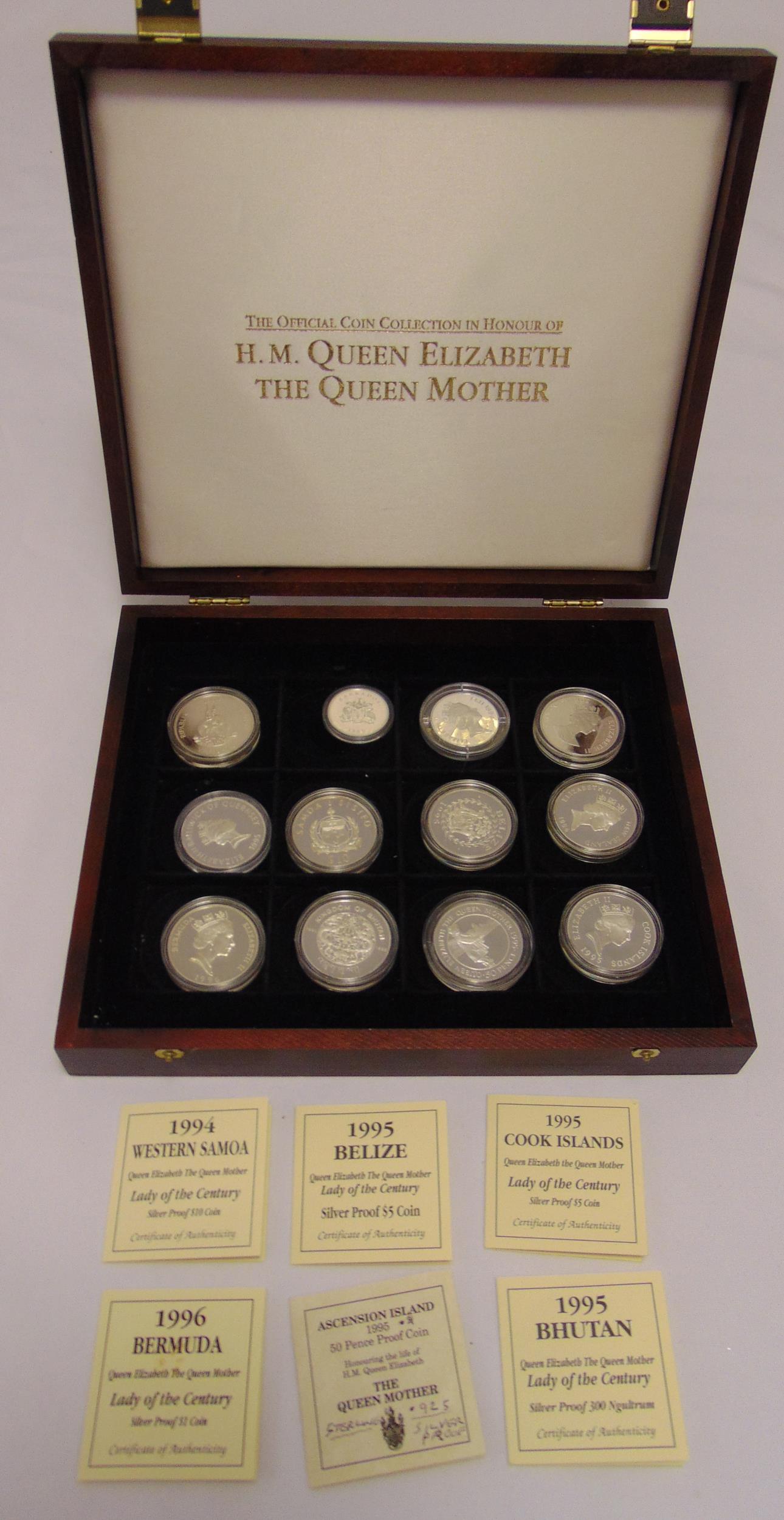 Twelve silver coins in plastic capsules to commemorate H.M. Queen Elizabeth and The Queen Mother