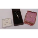 A quantity of costume jewellery to include necklaces and earrings in original fitted cases