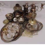 A quantity of silver plate to include trays, a teapot and condiments