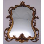 A Baroque style gilded wooden wall mirror, 77.5 x 60cm