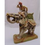 Imperial Amphora Turn porcelain figurine of an Arab gentleman riding an elephant on naturalistic