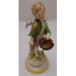 A Meissen Invalid Beggar Putti figurine L112 on raised circular base, marks to the base, 21.5cm (h)