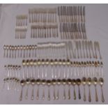 A quantity of silver plated flatware for twelve place settings to include knives, forks, spoons,