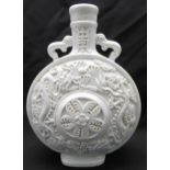 A Chinese blanc de chine moon flask decorated with dragons, flowers and scrolls, 33cm (h)