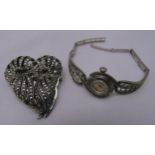 A hallmarked silver ladies wristwatch set with marquisettes and a marquisette brooch