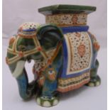 An oriental ceramic polychromatic figurine of an elephant, 43.5 x 50 x 23cm