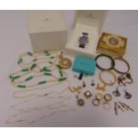A quantity of jewellery to include necklaces, rings, cufflinks, earrings, a Swarovski wristwatch and