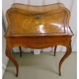 A French 19th century satinwood bureau de dame, the bombe hinged cover and sides with marquetry