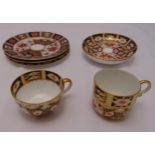 A quantity of Royal Crown Derby and Bloor Derby Imari pattern cups and saucers (7)