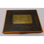 A late Victorian aesthetic movement stationary box, the hinged cover with engraved brass panel,22