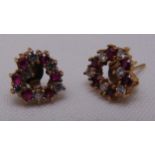 A pair of 9ct gold, diamond and ruby heart shaped earrings, approx total weight 2.2g