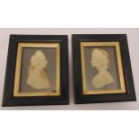 A pair of early 19th century wax profiles of a lady and a gentleman