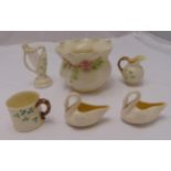 A quantity of Belleek porcelain to include a cream jug, flower vase and a mug (6)