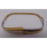 9ct gold and diamond bangle, approx total weight 9.0g