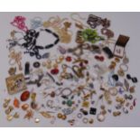 A quantity of costume jewellery to include necklaces, earrings, rings and brooches