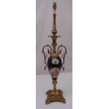 A gilt metal and porcelain table lamp on raised square base with scroll feet, 89cm (h)