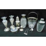 A quantity of hallmarked silver and white metal to include a sugar sifter, a candlestick, a glass