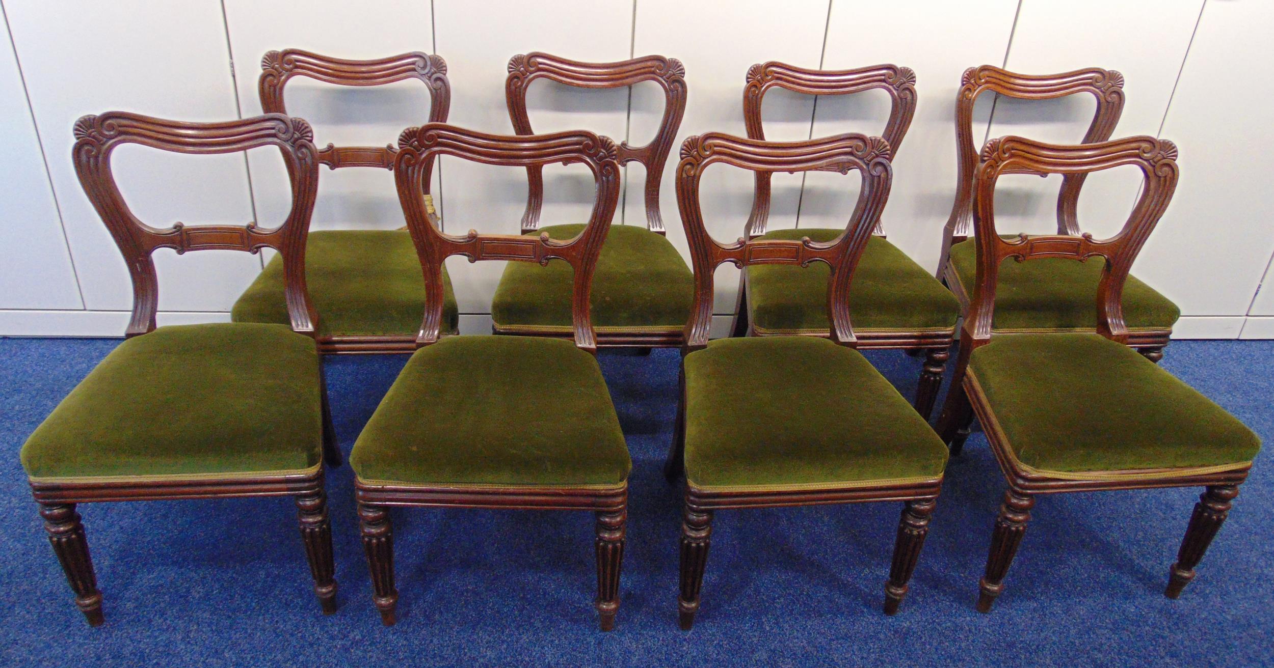 A set of eight Gillows dining chairs circa 1840, upholstered seats on four tapering fluted legs,