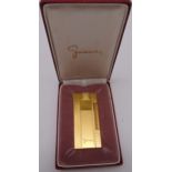 Givenchy 2000 gilded cigarette lighter in original packaging