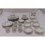 A Haviland Limoges Artois dinner service to include plates, a coffee pot, cups and saucers (39)