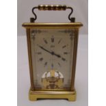 A Schatz 8 day brass carriage clock with white enamel dial and Roman numerals, 13cm (h)
