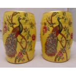 A pair of Chinese garden seats of barrel form yellow ground decorated with peacocks and flowers,