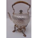 A Victorian hallmarked silver tea kettle on stand, compressed cylindrical, spirally fluted with