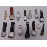 A quantity of ladies and gentlemans fashion wristwatches to include Seiko, Rotary and Swatch (14)