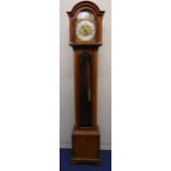 Canham of London chiming grandmother clock, silvered dial with Roman numerals and hinged glazed